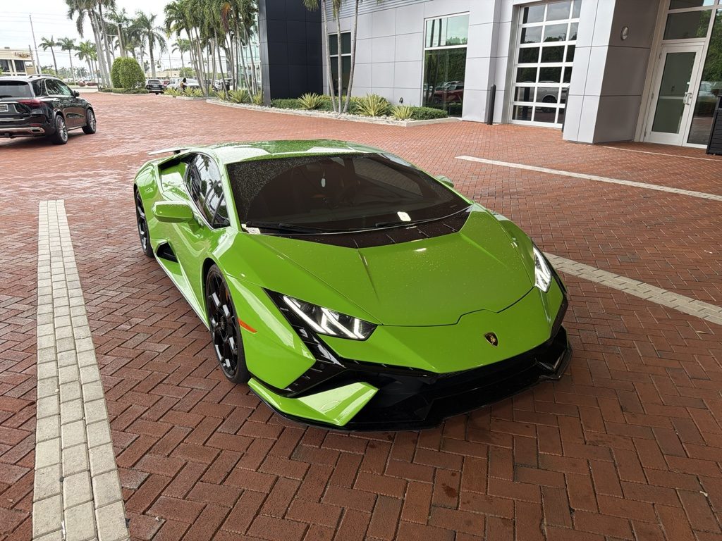Lamborghini Huracán Tecnica front three-quarter view showing the Y-shaped headlights and front splitter