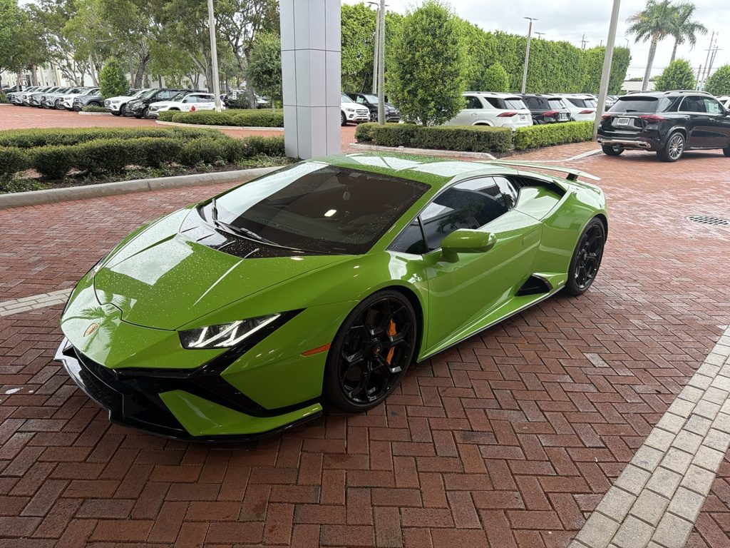Green Lamborghini Huracán Tecnica front three-quarter view