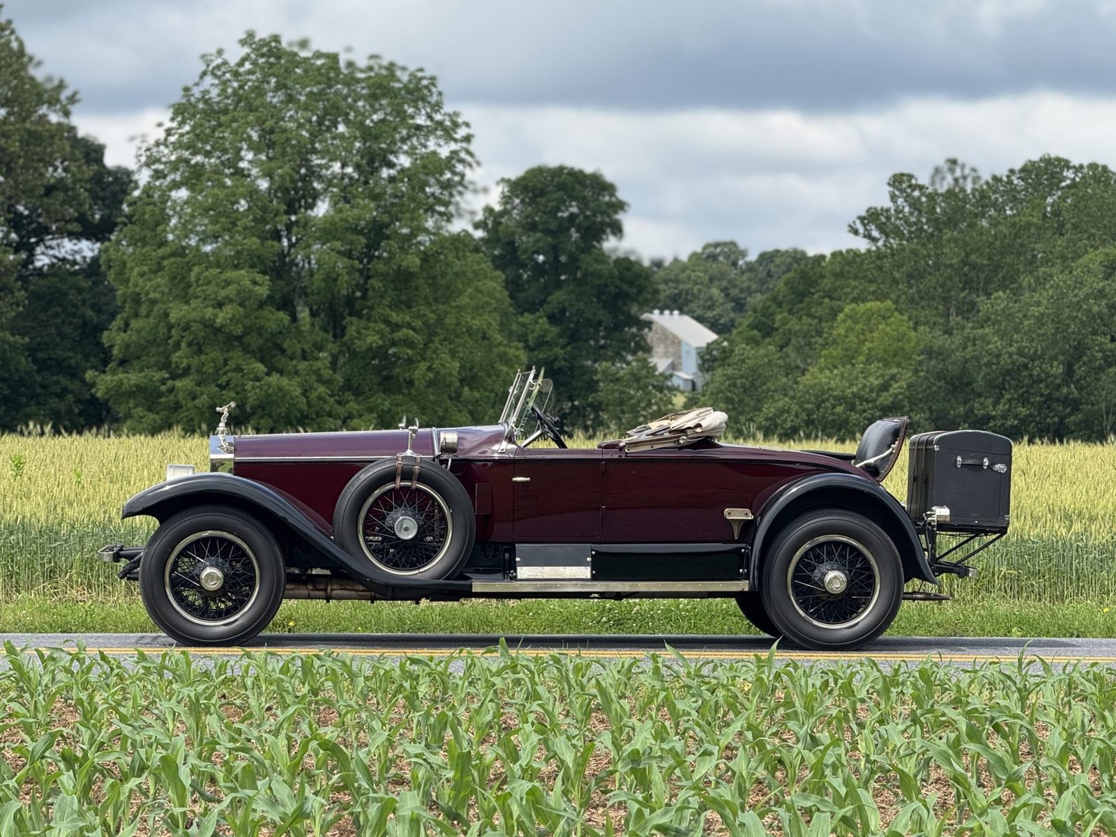 1925 Rolls-Royce Silver Ghost Piccadilly Roadster side profile in burgundy