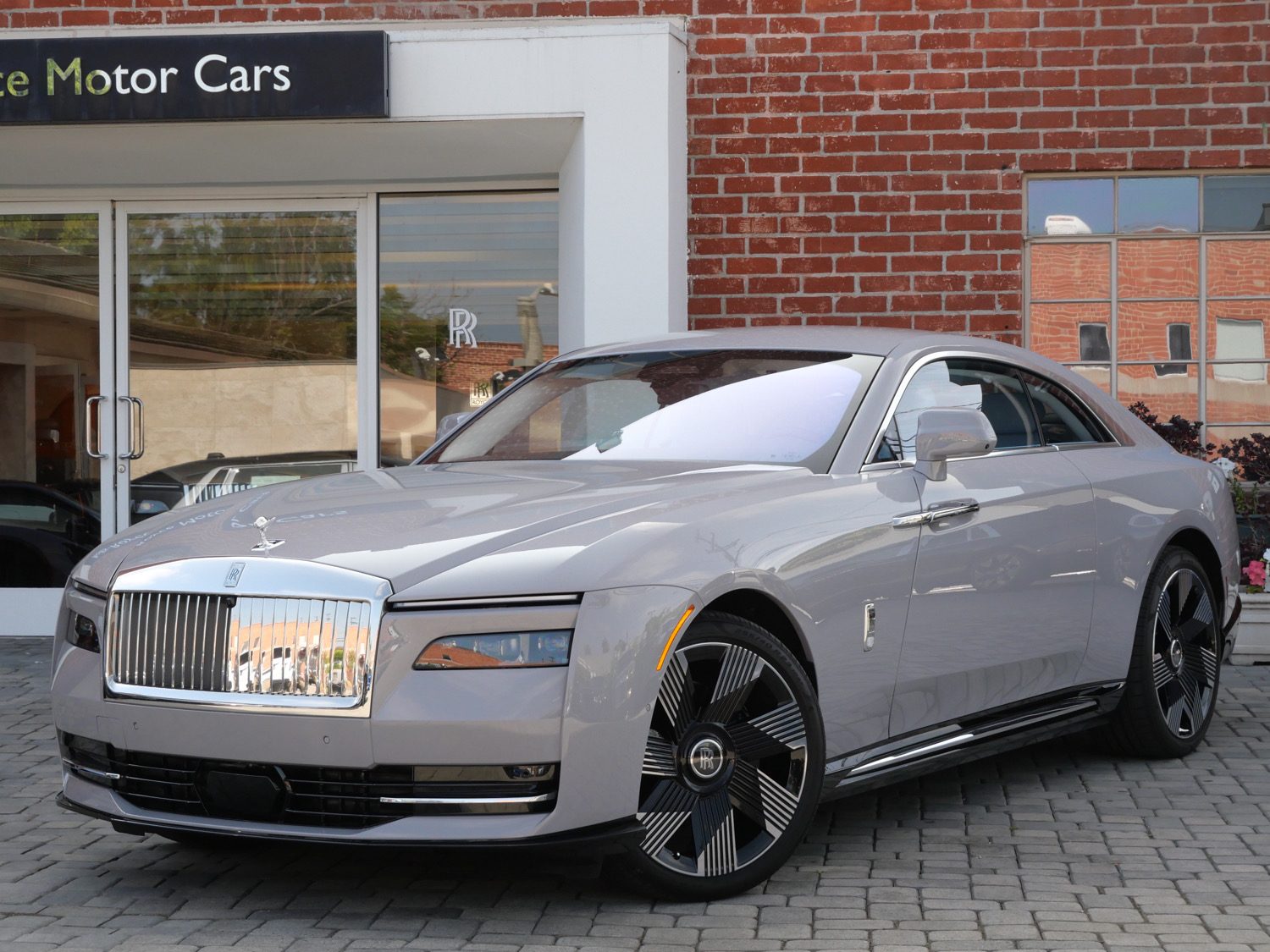 2024 Rolls-Royce Spectre in Tempest Grey, exterior three-quarter view