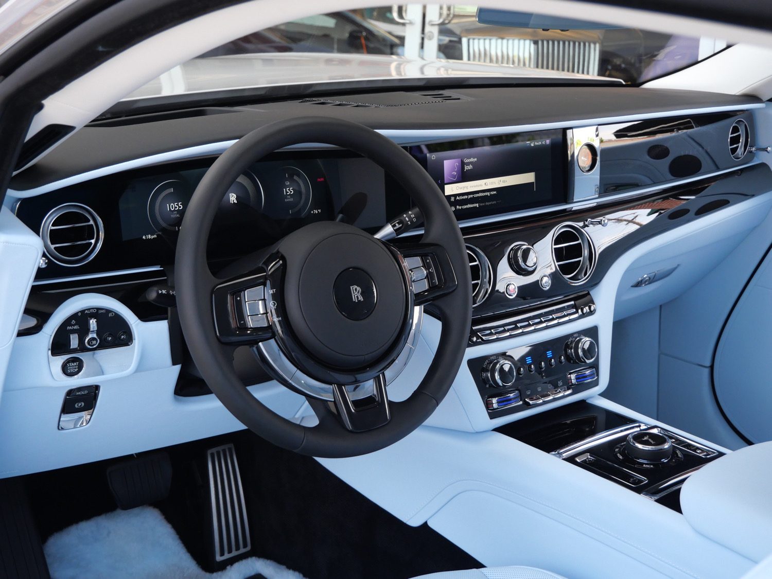 2024 Rolls-Royce Spectre rear three-quarter view